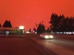 The morning sky glows red in Stayton, Ore., as wildfires, worsened by dry weather and strong winds, explode across the state.