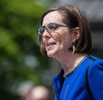 Oregon Gov. Kate Brown spoke to the public at the 2015 Armed Forces Commemoration outside the capitol building in Salem on Thursday, May 14, 2015.