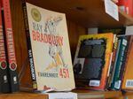 The irony of books like Fahrenheit 451 being banned in parts of the U.S. is not lost on the owners of Atlanta Vintage Books. Ray Bradbury's dystopian novel tells the story of a future where books have been outlawed in society.