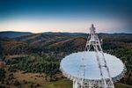 In this image released by NANOGrav, the radio frequency receiver platform 
for West Virginia's Green Bank Telescope rises above the dish.