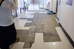In July, tiles are missing on the first floor at Franklin High School.
