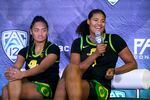 Oregon's Nyara Sabally, right, speaks next to Te-Hina Paopao during Pac-12 Conference NCAA women's college basketball media day on Tuesday, Oct. 12, 2021, in San Francisco.
