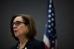 Oregon Gov. Kate Brown speaks at a press conference to address the coronavirus pandemic in Portland, Ore., Friday, March 20, 2020.