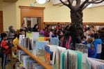 Four different school groups of children on field trips flood the library first thing in the morning.