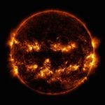 Active regions on the sun gave it the appearance of a jack-o'-lantern. This image is a blend of 171 and 193 angstrom light as captured by the Solar Dynamics Observatory on Oct. 8, 2014.