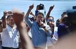 Honduran President Juan Orlando Hernández speaks to his supporters in Tegucigalpa, on Oct. 20, 2019. He spoke after opposition parties in Honduras accused him of running a drug and corruption network and called for street protests to demand the president step down.