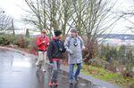 Two Cleveland High School students, Brandon Teeny and John Hoac, and Western Washington University Professor Troy Abel are measuring pollution on the Cleveland campus in south Seattle.
