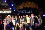 From left, Bebe Jay, Cassie Nova, Alexis Campbell Starr, Poison Waters, Emma Mcilroy, Eden Dawn, Michael Empric, BinKyee Bellflower, Mr. Mitchell and Summer Lynne Seasons on stage at Darcelle XV Showplace, July 12, 2023. Sixty drag artists performed and broke the Guinness World Record for longest continual drag artist performance.