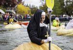 During the 2019 West Coast Giant Pumpkin Regatta members of the Pacific Giant Vegetable Growers club hollowed out their homegrown vegetables and raced around the lake.