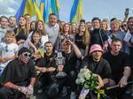 Ukraine's Kalush Orchestra, winners of the Eurovision Song Contest, pose with their trophy in Krakovets, at the Ukraine border with Poland, on May 16. The U.K., which placed second, is in talks to host next year's event instead of Ukraine due to the war.