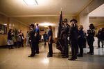 Oregon State Police troopers prepare to enter the House chamber before Gov. Kate Brown's inaugural address at the state Capitol in Salem, Ore., Monday, Jan. 14, 2019.