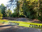 Caution tape surrounds the area around Lewis & Clark College’s swimming pool and lower Estate Garden on Aug. 30, 2022. One student died and two were injured Monday night when a free-standing column collapsed. Investigators learned that several hammocks were attached to the column when it collapsed.