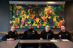Lieutenant Tina Jones, Travis Gamble, Sergeant Ken Duilio, and Lieutenant Jason Pearce answer questions during a press conference discussing a string of recent shootings in Portland.