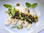 Filets of Dover sole topped with green olives and chunky lemon balm salsa verde