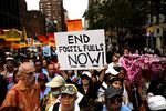 Climate activists attend a rally to end fossil fuels, in New York, Sunday, Sept. 17, 2023.