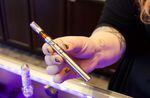 The CDC is warning people not to vape while an investigation figures out why six people have died and 450 sickened after vaping.