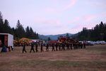 Firefighters are trained to walk in a line when out in the field. They keep that training in camp. Here, a team that has been working on the fire all day walks towards the food tent for dinner.