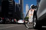 An electric vehicle is plugged into a charger in Los Angeles, Thursday, Aug. 25, 2022. California plans to require all new cars, trucks and SUVs to run on electricity or hydrogen by 2035 under a policy approved Thursday by regulators that seeks a dramatic cut in carbon emissions and an eventual end to gasoline-powered vehicles.