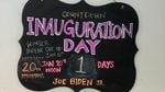 A sign that reads "inauguration day" with a countdown.