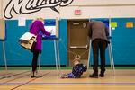 Mayor Jacob Frey casts his vote on Election Day alongside his family at the Marcy Arts Magnet Elementary School on Tuesday, Nov. 2, 2021 in Minneapolis.
