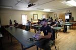 Oregon Department of Forestry wildfire trainees learn new skills in a classroom with social distancing.