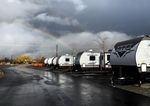 A rainbow appears over six travel trailers on site at the Gateway Project in Talent, Ore. A total 53 trailers will be arriving for wildfire survivors.