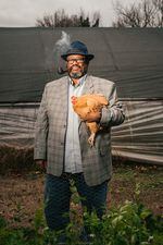 Pastor Chris Battle raises greens, tomatoes, kale, okra, beans and chickens at his Battlefield Farm & Gardens in Knoxville, Tenn. He also preaches.