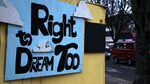 A sign welcomes visitors to the Right 2 Dream, Too homeless camp in downtown Portland.