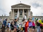Protesters march outside the Indiana state Capitol building on July 25, 2022, in Indianapolis as activists gathered during a special session. Early last month, Indiana lawmakers passed legislation banning most abortions, which went into effect Thursday. 