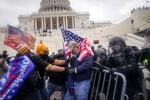 Trump supporters try to break through a police barrier, Wednesday, Jan. 6, 2021, at the Capitol in Washington. As Congress prepares to affirm President-elect Joe Biden's victory, thousands of people have gathered to show their support for President Donald Trump and his claims of election fraud.