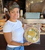 Chef Sandra Arnerich serves up a standard baked Bianco Verde pizza from Renata. She and her husband Nick created a frozen pizza line for their pantry during the pandemic. They have now closed the restaurant to focus all their energy on the pizza business. 