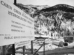 The sign at the Upper Reservoir construction area gives details of the Public Service Company's Cabin Creek Pumped Storage Project, a hydroelectric facility at elevations above 10,000 feet near Georgetown, Colorado on April 22 1965.