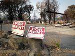 Rent signs near a mobile home park in Phoenix that was entirely destroyed by the Almeda Fire.