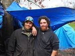 Mark Paddock (left) and Christian St. Peter had tents set up near Delta Park in North Portland on March 23, 2022.