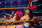 Athena Estrada drop-kicks Sakura during a lucha libra extravaganza in Aurora, Colorado. July 24, 2022.