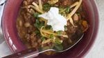 In this easy chili, use up cooked meat you have on hand. Jill Lightner’s suggestions include rotisserie chicken; sliced, chopped ham; leftover roast turkey; leftover Porterhouse steak cut into bits and frozen; or smoked turkey leg (you used half in a sandwich and stashed the rest in the freezer for just this opportunity).
