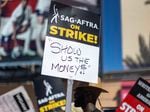 A picket line outside of FOX Studios in Los Angeles. Hollywood actors have been on strike since mid-July; writers have been on strike since May.