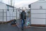 Tina Kotek tours the sleeping pod areas at Arbor Lodge in North Portland in January 2022. Kotek says she had to pressure Multnomah County officials for these. “I was like, ‘buy the pods,’” she says. “The county was losing their mind.”