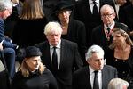 Former Prime Minister of the United Kingdom Theresa May with her husband Philip May and former Prime Minister of the United Kingdom Boris Johnson with his wife Carrie Johnson and former Prime Minister of the United Kingdom Gordon Brown with his wife Sarah Jane Brown depart Westminster Abbey after the funeral service of Queen Elizabeth II on Monday.