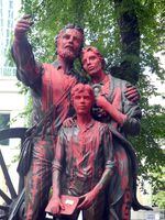Protesters doused a sculpture honoring early Portland business leader William W. Chapman in red paint and messages against colonialism. The statue is in downtown's Chapman Square, which William Chapman sold to the city in 1870.