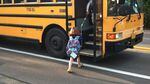 Katie Brown boards the bus to school on her first day of first grade at Charles F. Tigard Elementary in 2013.