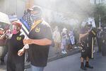Proud Boys Tusitala "Tiny" Toese (left) and Alan Swinney (right) during pro-Trump and pro-police demonstrations in downtown Portland. Despite violence in the streets, police were notably absent and never declared an unlawful assembly.