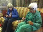 Helen Hardwick, left and Helen Patton talk about the refuge occupation during knitting group in Burns.