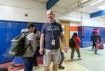 Paraeducator David Waldrip in the hallways as students change classes at Cedar Park Middle School, Feb. 22, 2023. 