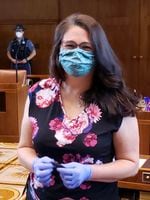 Oregon lawmaker Sara Gelser — here on the floor of the State Senate — introduced a bill to guarantee people with disabilities got equal care in hospitals during the pandemic.