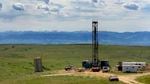 In this June 20, 2007 file photo, a natural gas drilling rig is seen outside of Wyarno, Wyo. The Trump administration eased restrictions on drilling, grazing and mining in sage grouse territory across the Intermountain West.