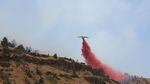 An air tanker drops retardant over the Corner Creek fire in Central Oregon, July 11, 2015.