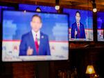 Republican presidential candidate and Florida Gov. Ron DeSantis is displayed on television screens at a watch party for the first 2024 Republican presidential primary debate on August 23 in Washington.