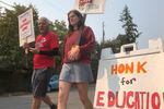 Staff at Seattle's Northgate Elementary School picket outside the building on Sept. 9, 2022. That strike has been settled and students started classes Wednesday.