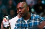 Comedian Dave Chappelle attends a boxing bout Nov. 6, 2021, in Las Vegas.